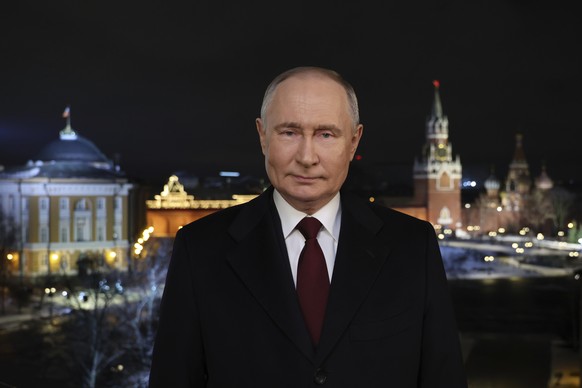 Russian President Vladimir Putin speaks during a recording of his annual televised New Year&#039;s message on New Year&#039;s Eve in the Kremlin in Moscow, Russia, Sunday, Dec. 31, 2023. (Gavriil Grig ...