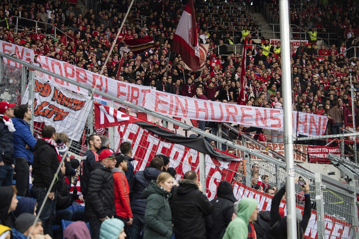 Bayern Munich supporters lift a banner reading 'Hopp remain a son of a bitch' against Hoffenheim club patron Dietmar Hopp during the German Bundesliga soccer match between TSG Hoffenheim and ...