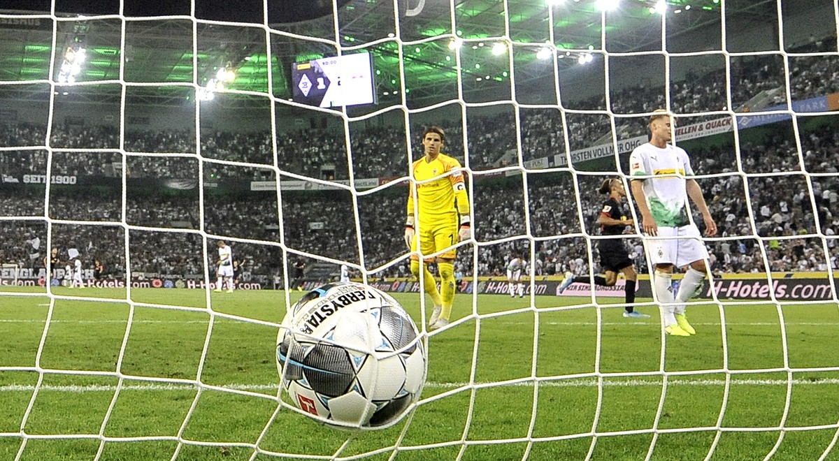 Moenchengladbach's goalkeeper Yann Sommer watches the ball in his goal after Leipzig's Timo Werner scored for the third time during the German Bundesliga soccer match between Borussia Moench ...