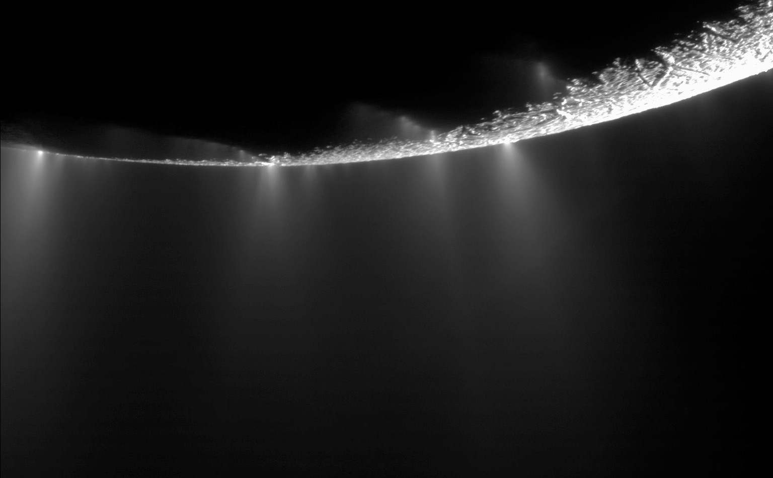 This photo provided by NASA shows water vapor jets, emitted from the southern polar region of Saturn&#039;s moon Enceladus. Scientists have uncovered a vast ocean beneath the icy surface of the moon,  ...