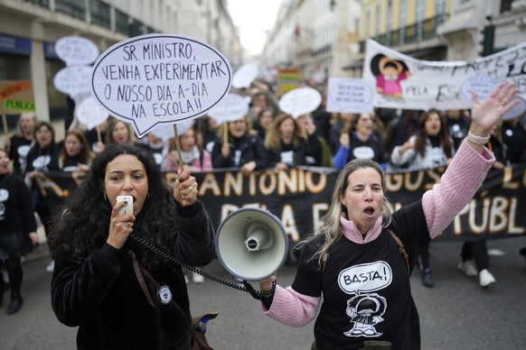 Demonstrators march through the center of Lisbon during a teachers' demonstration in Lisbon, Saturday, February 11, 2023. Among the many demands of teachers are better working conditions, salaries, career opportunities...