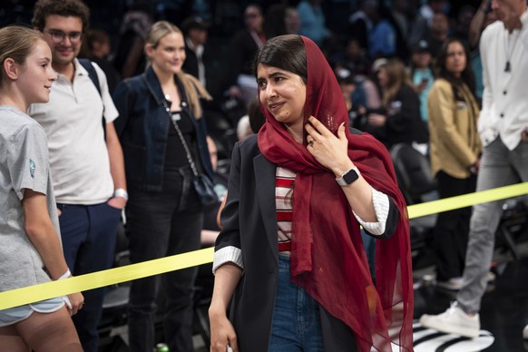Malala Yousafzai, Nobel Prize laureate, attends Game 2 in the first round of the WNBA basketball playoffs between the New York Liberty and the Phoenix Mercury, Wednesday, Sept. 17, 2025, in New York.  ...