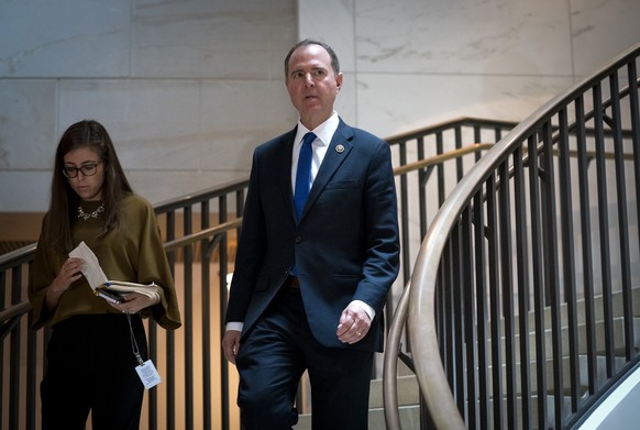 House Intelligence Committee Chairman Adam Schiff, D-Calif., returns to the secure area at the Capitol where former U.S. Ambassador William Taylor, is testifying in the impeachment investigation of Pr ...