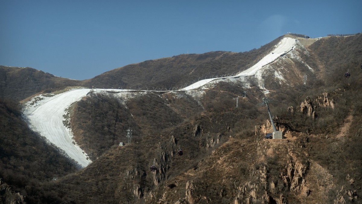 A ski run lined with artificial snow is seen at the National Alpine Skiing Center in Yanqing on the outskirts of Beijing, Feb. 5, 2021. The high demand for artificial snow at February's Beijing W ...