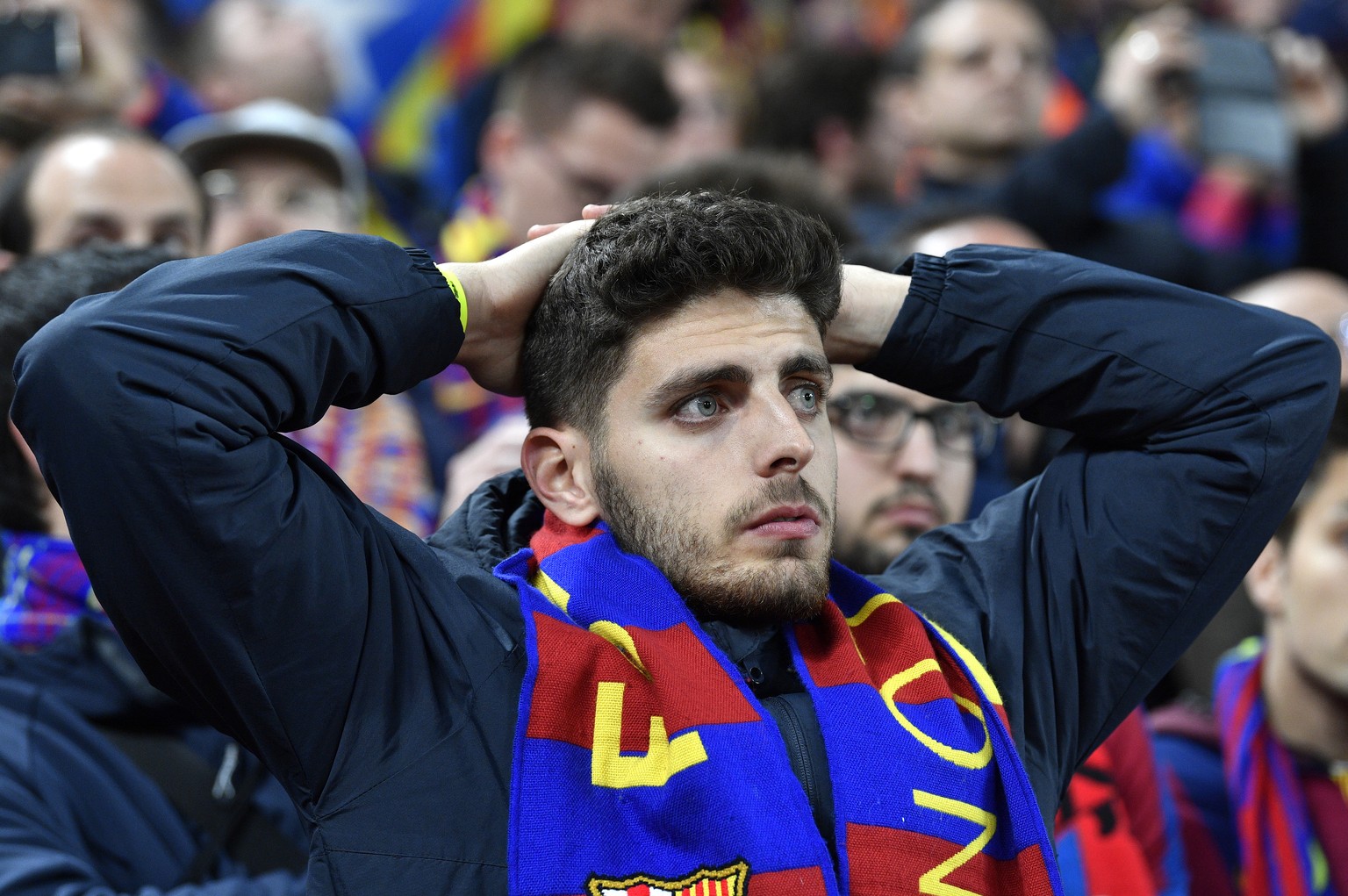 epa07554713 Fans of Barcelona react after the UEFA Champions League semi final second leg soccer match between Liverpool FC and FC Barcelona at Anfield, Liverpool, Britain, 07 May 2019. Liverpool won  ...