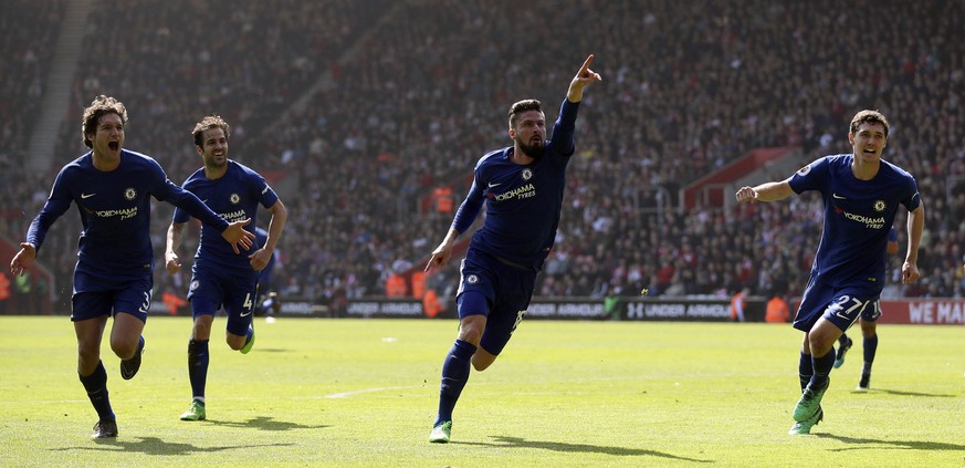 Chelsea&#039;s Olivier Giroud, center, celebrates scoring his side&#039;s third goal of the game during their English Premier League soccer match against Southampton at St Mary&#039;s Stadium, Southam ...