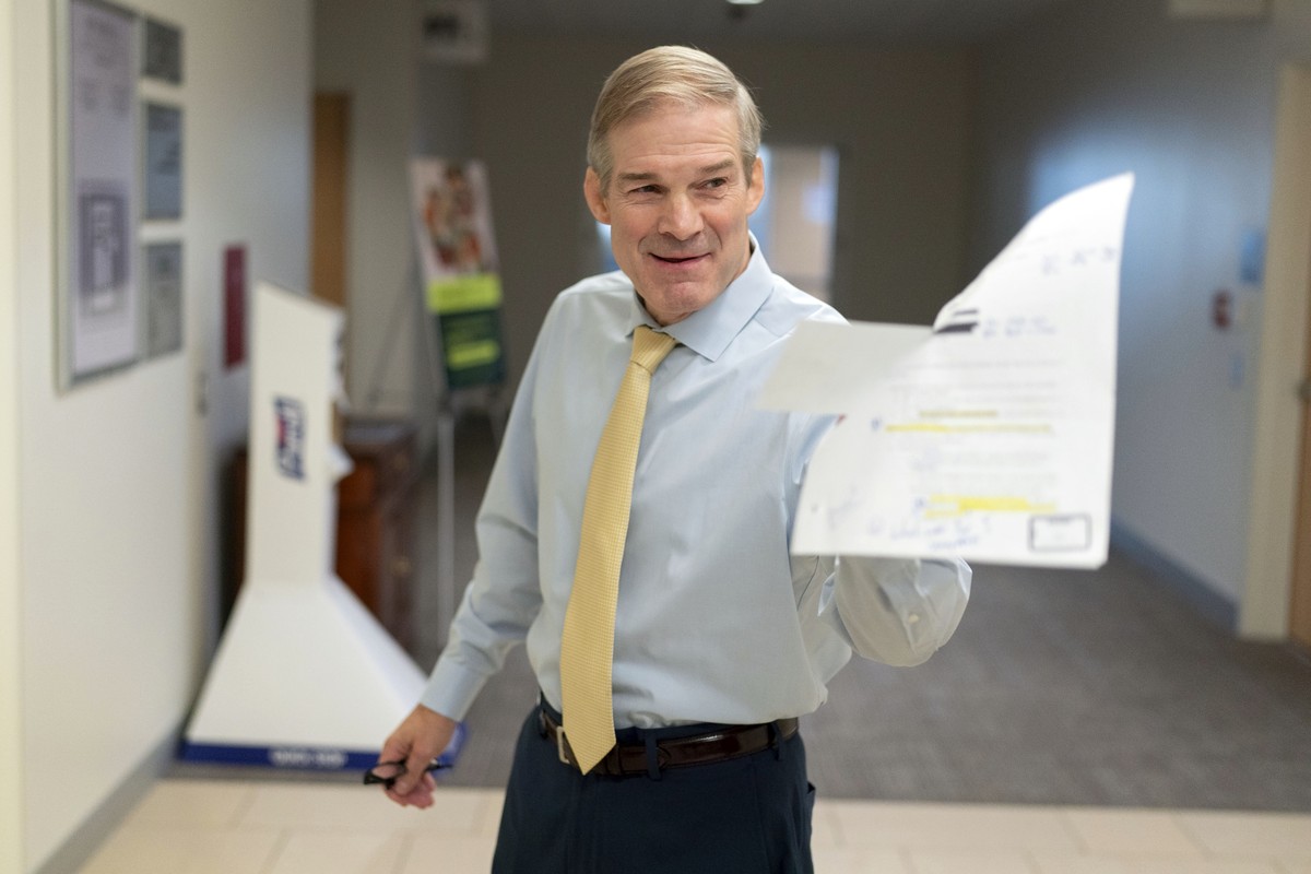 FILE - Rep. Jim Jordan, R-Ohio, holds an Justice Department email as he speaks with reporters Nov. 7, 2023, in Washington. House Republicans have issued a subpoena to a senior federal prosecutor invol ...