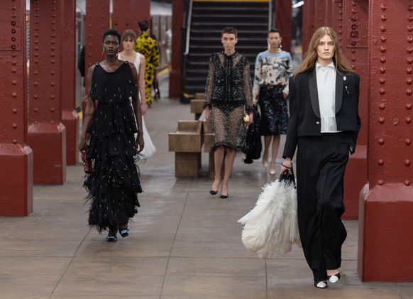 Models walk the runway during the CHANEL 2025/26 Métiers d'art fashion show at Bowery subway station on Tuesday, Dec. 2, 2025, in New York. (Photo by CJ Rivera/Invision/AP)
CHANEL 2025,26 M' ...