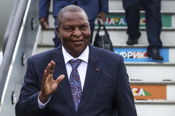 President of the Central African Republic Faustin-Archange Touadera waves to journalists upon his arrival at Pulkovo International Airport to participate the Russia Africa Summit in St. Petersburg, Ru ...