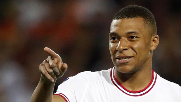 epa09947546 Kylian Mbappe reacts during the soccer ligue 1 match between Montpellier HSC and Paris Saint Germain, at La Mosson stadium in Montpellier, France, 14 May 2022. EPA/Guillaume Horcajuelo