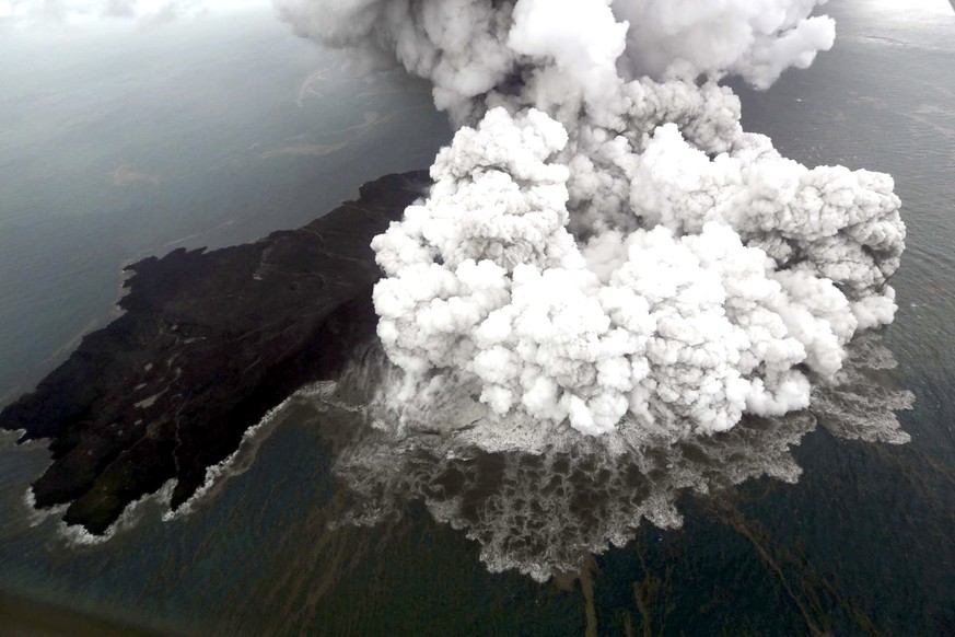 epa07247266 An aerial view shows mount Anak Krakatau erupting in Lampung, Indonesia, 23 December 2018 (issued 24 December 2018). According to the Indonesian National Board for Disaster Management (BNP ...