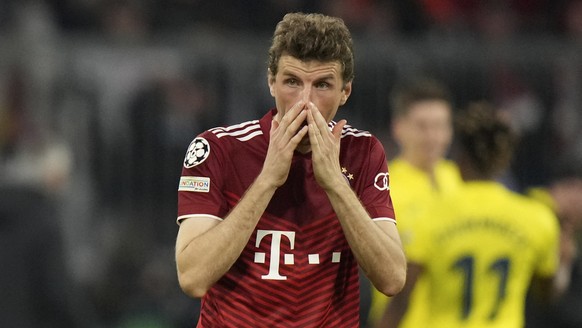 Bayern's Thomas Mueller reacts to his team's loss end the Champions League, second leg, quarterfinal soccer match between Bayern Munich and Villareal at the Allianz Arena, in Munich, Germany ...