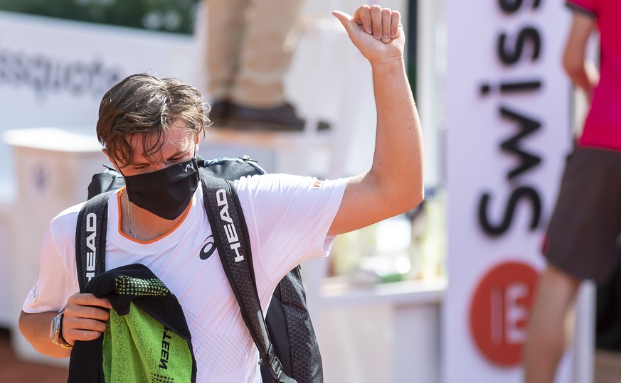 Dominic Stephan Stricker of Switzerland, reacts after losing a game against to Pablo Andujar, of Spain, during their round of 8 (1/4 final ) men&#039;s match, at the ATP 250 Tennis Geneva Open tournam ...