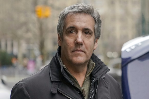 FILE - Michael Cohen leaves a lower Manhattan building after meeting with prosecutors, Friday, March 10, 2023, in New York. Cohen can?t hold his former boss, ex-president Donald Trump, liable for alle ...