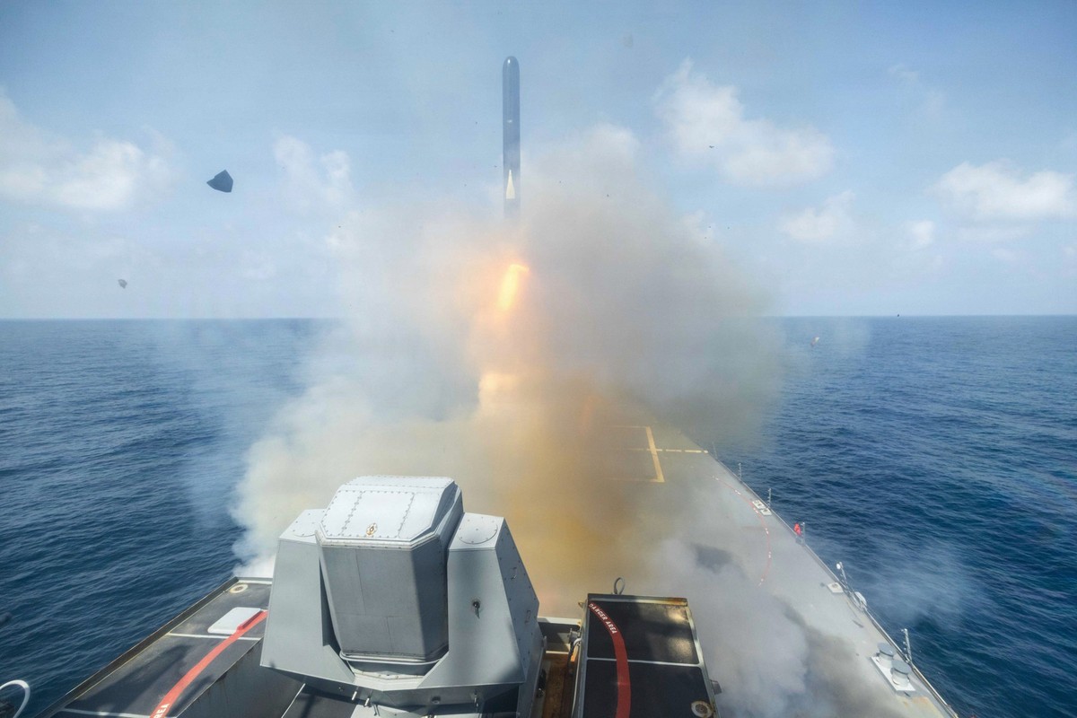 In this image provided by U.S. Central Command, the Arleigh Burke-class guided-missile destroyer USS Spruance (DDG 111) fires a Tomahawk Land Attack Missile (TLAM) in support of Operation Epic Fury, o ...