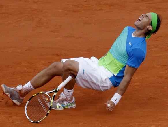 FILE - In this Sunday, June 6, 2010 file photo, Spain&#039;s Rafael Nadal celebrates after defeating Sweden&#039;s Robin Soderling during a men&#039;s finals match for the French Open tennis tournamen ...