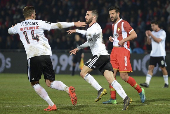 epa07379541 Rafa Silva (C) of Benfica celebrates with Haris Seferovic (L) the scoring of the team`s second goal against Desportivo das Aves during their Portuguese First League soccer match held at De ...