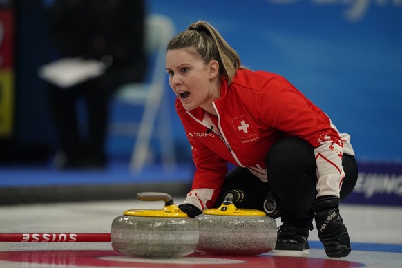 Jenny Perret, of Switzerland, yells to her teammate during the mixed doubles curling match against Norway at the Beijing Winter Olympics Monday, Feb. 7, 2022, in Beijing. (AP Photo/Brynn Anderson)
Jen ...