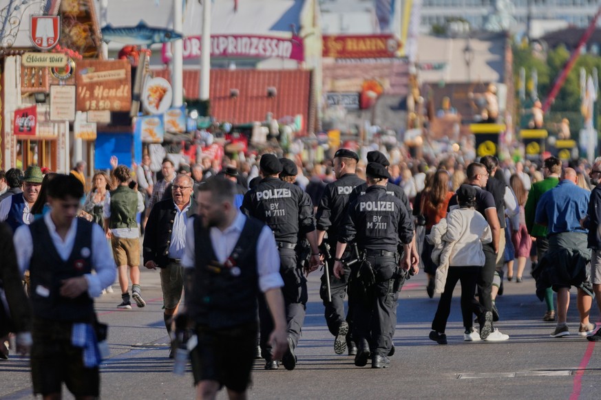 German police officers patrol at the 191st Oktoberfest beer festival in Munich, Germany, Saturday, Sept.19, 2026. (AP Photo/Matthias Schrader)
Germany Oktoberfest Opening