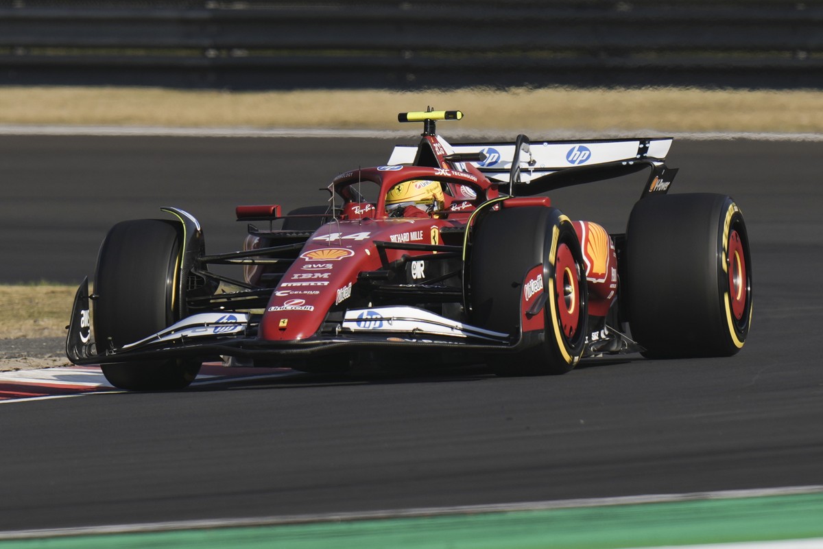 Ferrari driver Lewis Hamilton of Britain steers his car during the sprint qualifying at the Shanghai International Circuit in Shanghai, China, Friday, March 21, 2025, ahead of the Chinese Formula One  ...