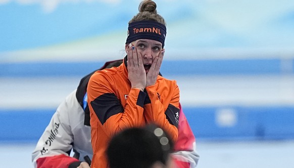 Ireen Wust of the Netherlands reacts after finding out she won the gold medal in the women&#039;s speedskating 1,500-meter race at the 2022 Winter Olympics, Monday, Feb. 7, 2022, in Beijing. (AP Photo ...