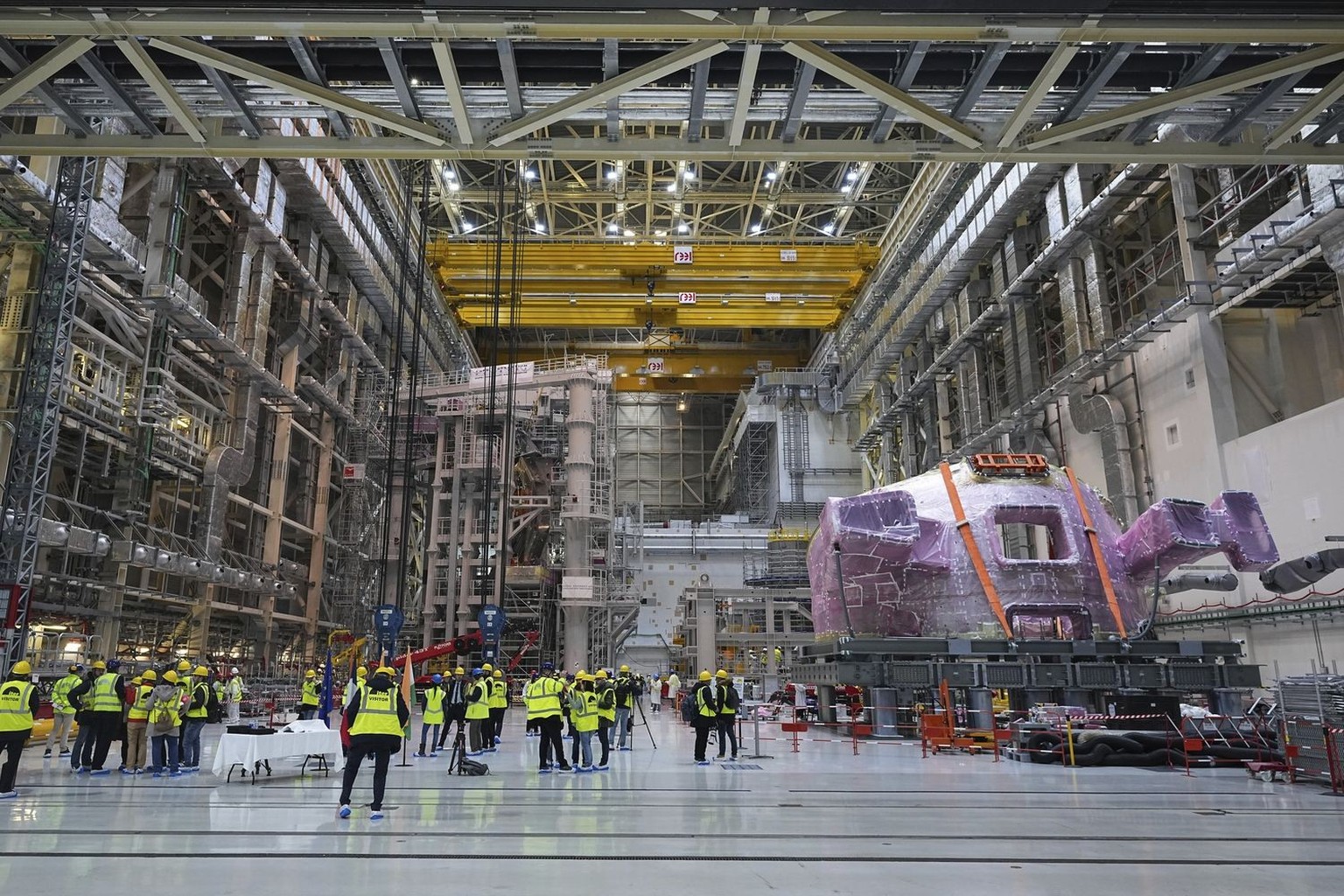 Journalists wait ahead of French President Emmanuel Macron and Indian Prime Minister Narendra Modi visit to ITER (International Thermonuclear Experimental Reactor) in Saint-Paul-les-Durance, southern  ...