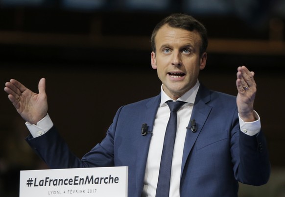 Presidential candidate Emmanuel Macron gestures as he speaks during a meeting in Lyon, central France, Saturday, Feb. 4, 2017. Untested former budget minister Emmanuel Macron, who rebelled against his ...