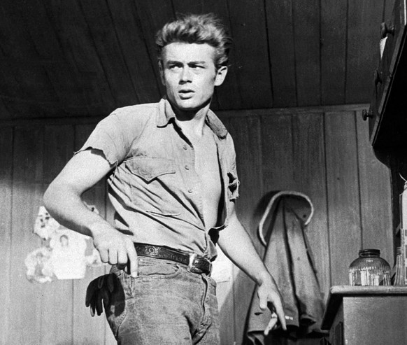FILE - This 1955 file photo shows actor James Dean. Until the 1950s, jeans had been called overalls or waist overalls, but after teens started referring to them as jeans, Levi’s began using the monike ...