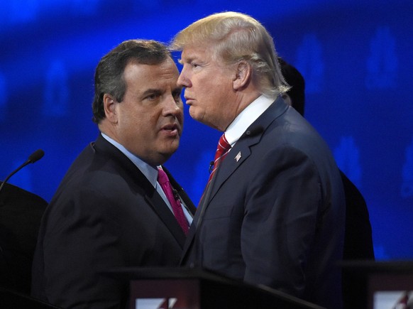 FILE - In this Oct. 28, 2016 file photo, New Jersey Gov. Chris Christie and Donald Trump talk during a break in the CNBC Republican presidential debate at the University of Colorado in Boulder, Colo.  ...