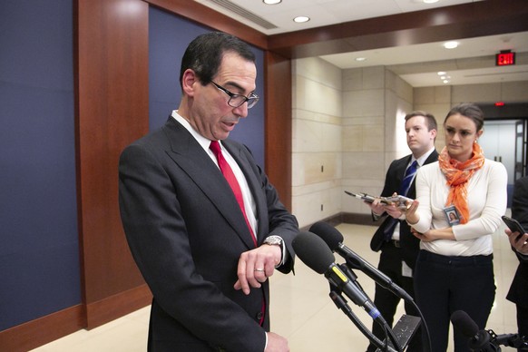 Treasury Secretary Steven Mnuchin speaks to reporters after giving a classified briefing to members of the House of Representatives, telling them that the Trump administration will keep strict U.S. sa ...