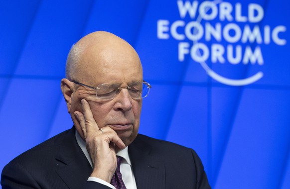 epa08966365 German Klaus Schwab, Founder and Executive Chairman of the World Economic Forum, WEF, waits prior a videoconference with German Chancellor Merkel at the Davos Agenda, in Cologny near Genev ...