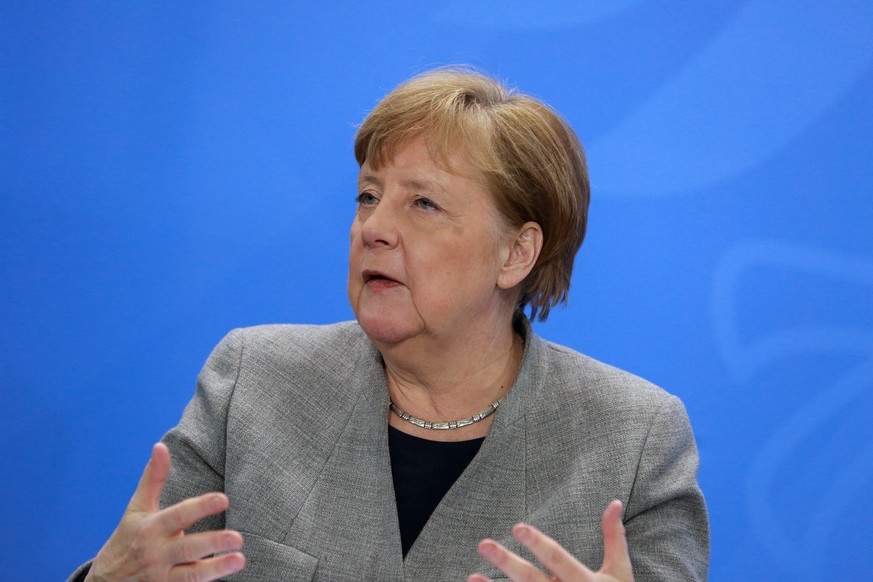 epa08364968 German Chancellor Angela Merkel addresses a press conference about the latest plans of the German government to slowly ease lockdown restrictions imposed during the coronavirus disease (CO ...