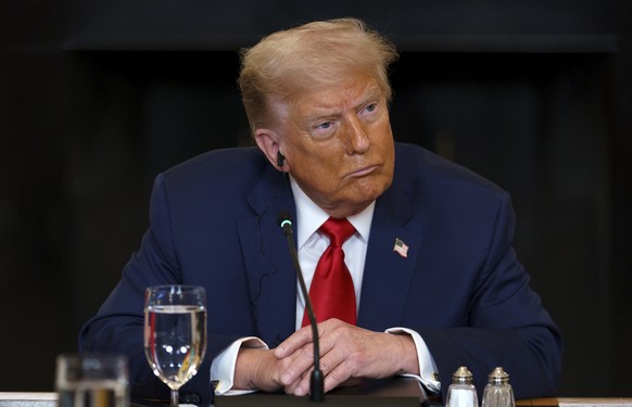 epa12227695 US President Donald Trump during a meeting with African leaders at the White House, Washington, DC, USA, 09 July 2025. President Trump is meeting with the leaders of Gabon, Guinea-Bissau,  ...