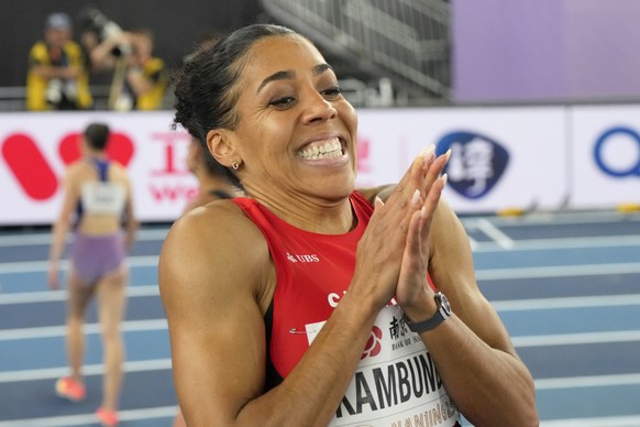 KEYPIX - Mujinga Kambundji, of Switzerland, reacts after winning the gold medal in the women&#039;s 60 meters final at the World Athletics Indoor Championships in Nanjing, China, Saturday, March 22, 2 ...