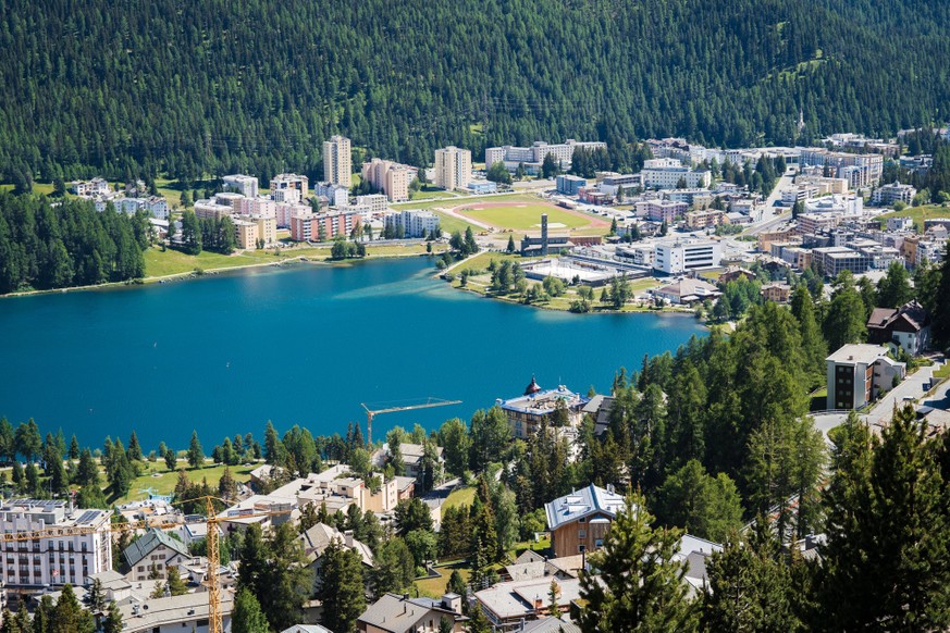 RECORD DATE NOT STATED Switzerland, St.Moritz - June 6, 2023: aerial view to the city St. Morirz and lake on sunny day Switzerland, St.Moritz - June 6, 2023: aerial view to the city St. Morirz and lak ...