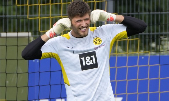 Borussia Dortmund's new goal keeper Gregor Kobel reacts during a training session of German Bundesliga soccer club Borussia Dortmund, in Dortmund, Germany, Thursday, July 15, 2021. (AP Photo/Mart ...
