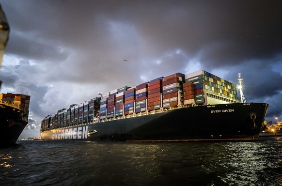 epa09375464 The container ship Ever Given arrives at the ECT (Europe Container Terminals) Delta terminal in the port of Rotterdam, the Netherlands, early 29 July 2021. The container ship that last Mar ...