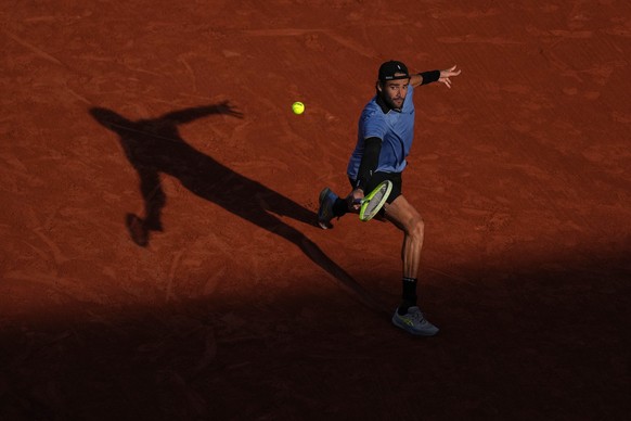 Italy's Matteo Berrettini returns to Argentina's Juan Manuel Cerundolo during the fourth-round tennis match at the French Open in Paris, Monday, June 1, 2026. (AP Photo/Thibault Camus)
Matte ...