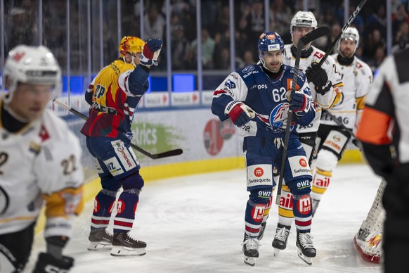 Der Torschuetze Denis Malgin (ZSC), rechts, jubelt nach dem Tor zum 1:0 bei dem Spiel 1 des Playoff Viertelfinals der Eishockey National League zwischen den ZSC Lions und dem HC Lugano am $Saturday$,  ...