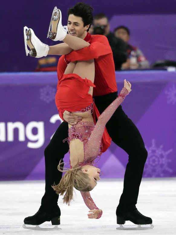 Kaitlyn Weaver and Andrew Poje of Canada perform during the ice dance, short dance figure skating in the Gangneung Ice Arena at the 2018 Winter Olympics in Gangneung, South Korea, Monday, Feb. 19, 201 ...