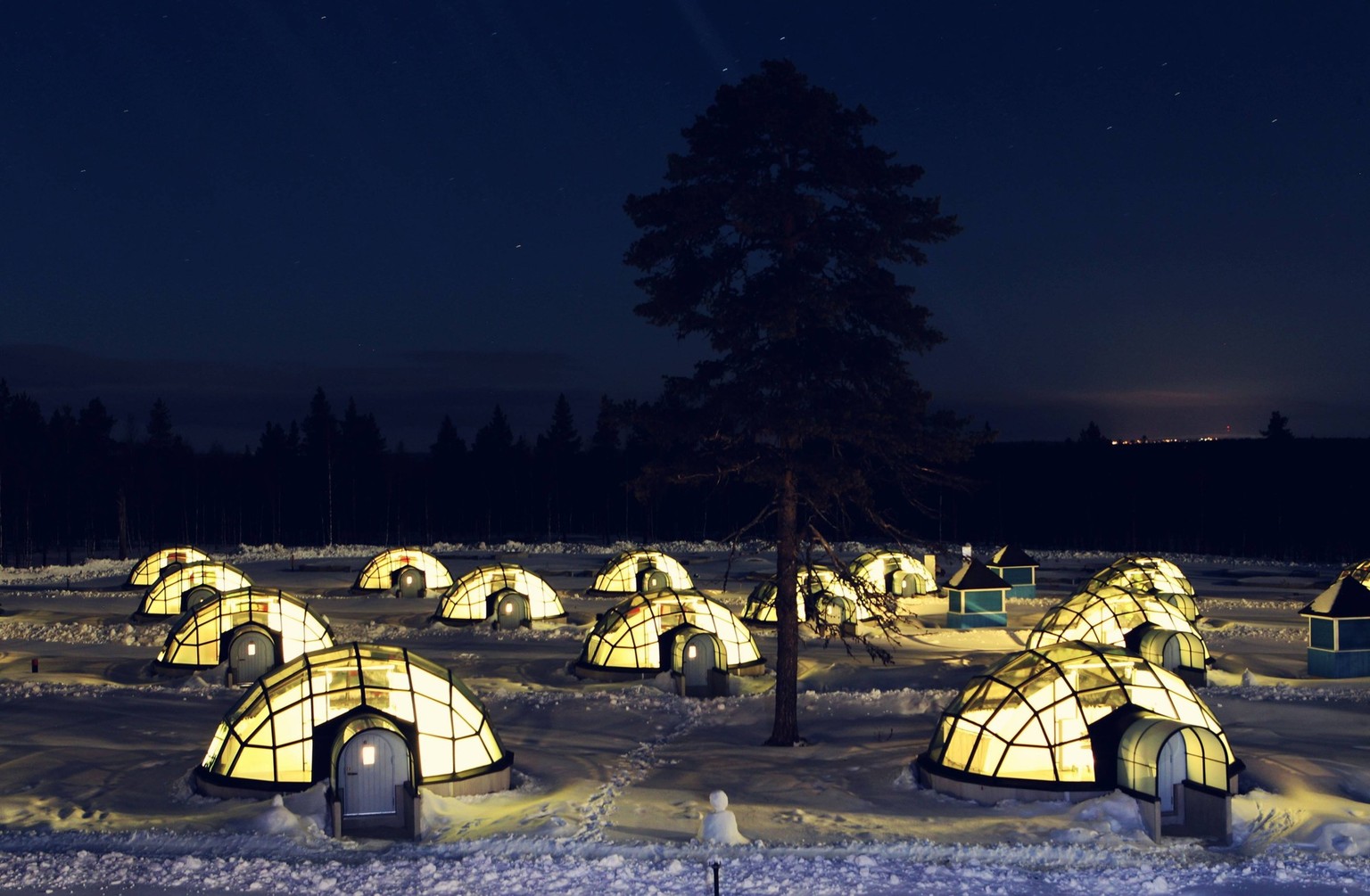 Photo taken on March 16, 2014 shows newly built glass igloos in Kakslauttanen, northern Finland. Thanks to booming arctic tourism, a resort in Kakslauttanen in northern Finland is being expanded, with ...