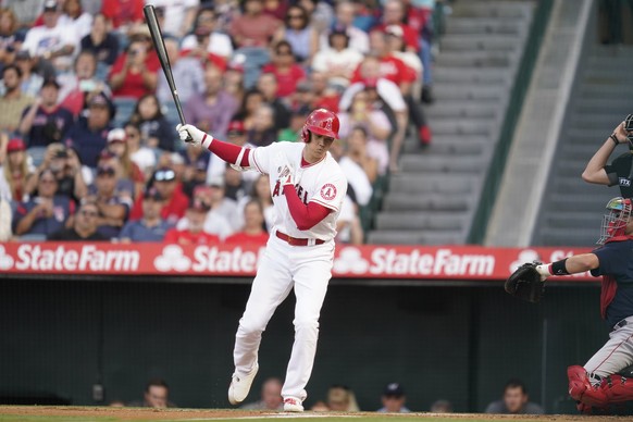Los Angeles Angels designated hitter Shohei Ohtani (17) reacts after striking out during the first inning of a baseball game against the Boston Red Sox in Anaheim, Calif., Wednesday, June 8, 2022. (AP ...