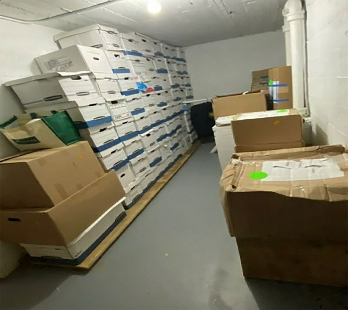 PALM BEACH, FLORIDA - UNSPECIFIED: In this handout photo provided by the U.S. Department of Justice, stacks of boxes in the storage room can be observed at former U.S. President Donald Trump's Ma ...