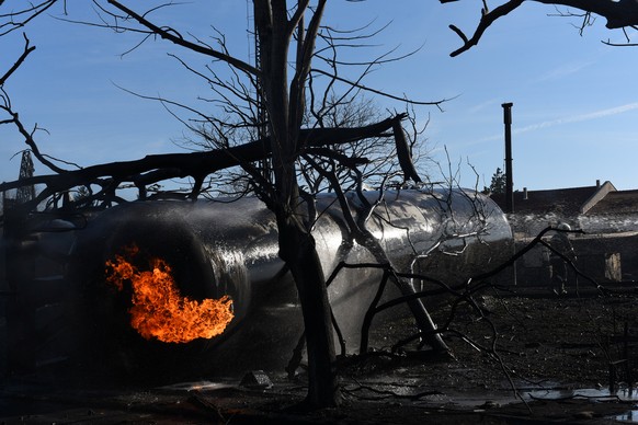 Firefighters work on the site where a cargo train derailed and exploded in the village of Hitrino, Bulgaria, December 10, 2016. Impact Press Group/Petko Momchilov/via REUTERS ATTENTION EDITORS - THIS  ...