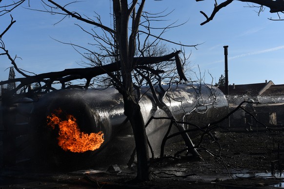 Firefighters work on the site where a cargo train derailed and exploded in the village of Hitrino, Bulgaria, December 10, 2016. Impact Press Group/Petko Momchilov/via REUTERS ATTENTION EDITORS - THIS  ...