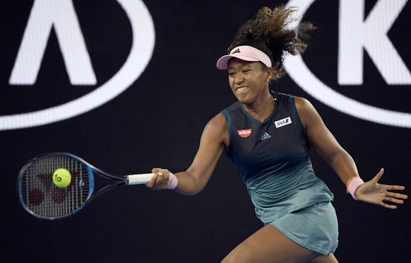 JapanÃfs Naomi Osaka makes a forehand return to SloveniaÃfs Tamara Zidansek during their second round match at the Australian Open tennis championships in Melbourne, Australia, Thursday, Jan. 17, 20 ...