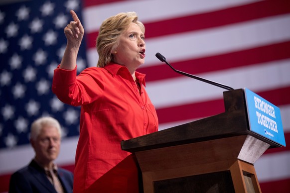 Democratic presidential candidate Hillary Clinton, accompanied by former President Bill Clinton, left, speaks at a rally at David L. Lawrence Convention in Pittsburgh, Saturday, July 30, 2016. Clinton ...