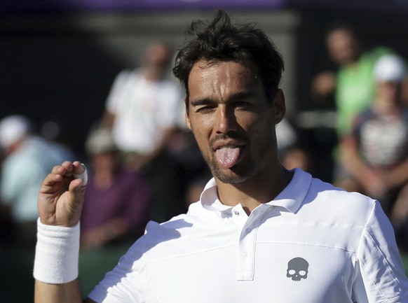 Italy&#039;s Fabio Fognini celebrates after winning his Men&#039;s Singles Match against Russia&#039;s Dmity Tursunov on day one at the Wimbledon Tennis Championships in London Monday, July 3, 2017. ( ...