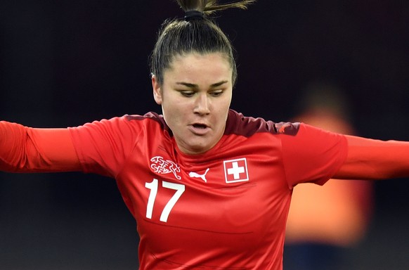 Swiss Svenja Foelmli, left, in action against Romania&#039;s Florentina Olar, right, during the FIFA Women&#039;s World Cup 2023 qualifying round group G soccer match between Switzerland and Romania a ...