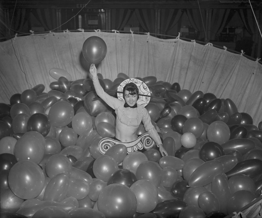 Sixteen year-old Goldsmiths&#039; College student and future fashion designer, Mary Quant, helping with preparations for the Chelsea Arts Ball at the Royal Albert Hall, London, 30th December 1949. (Ph ...